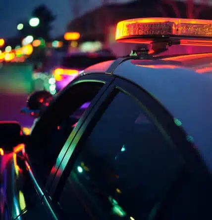 Close up image of the top of a police car.