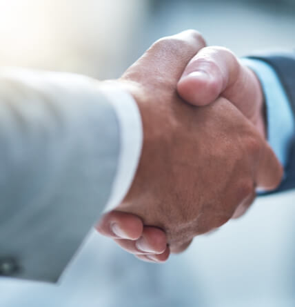 A close up image of a handshake.